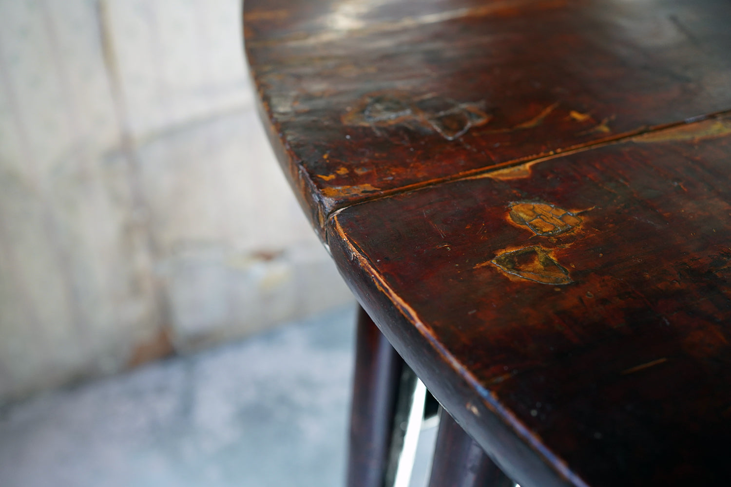 A 19thC Chinese Lacquered Circular Dining Table