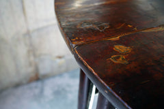 A 19thC Chinese Lacquered Circular Dining Table