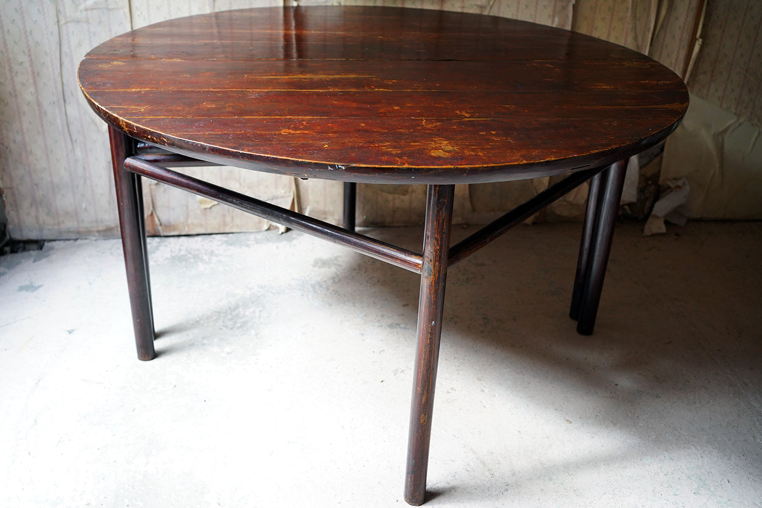A 19thC Chinese Lacquered Circular Dining Table