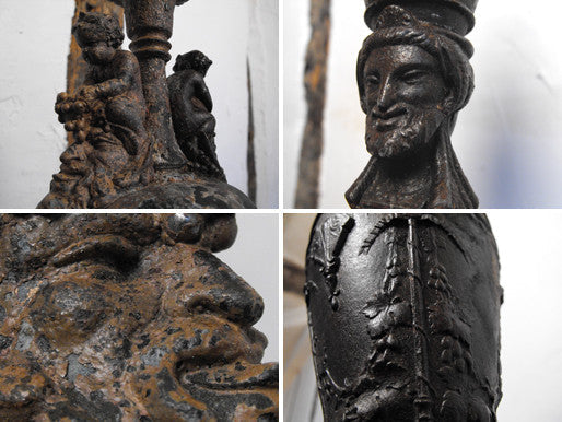 A Classical Form Spelter Lamp with Putti & Grapes above Bacchus Heads