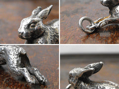 A Delightful Cast Silver Plate Charm Pendant Formed as a Running Hare
