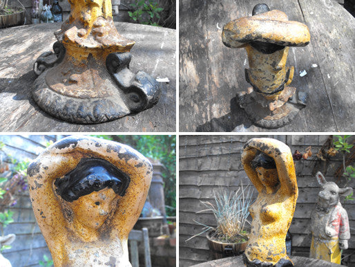 A Beautiful Painted Cast Iron Figural Door Stop of a Scantily Dressed Lady