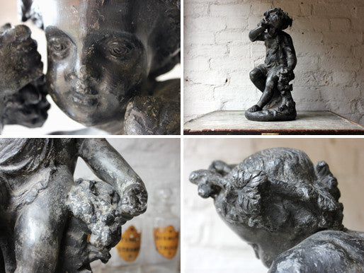A Beautiful George III Period Lead Garden Ornament Cast as a Bacchanalian Putto