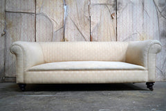 A Good Quality Late Victorian Upholstered Oak Chesterfield Sofa c.1880