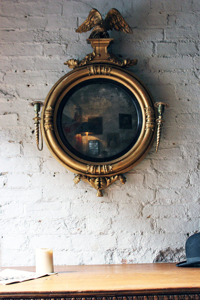A Good Regency Giltwood & Gesso Girandole Convex Mirror Surmounted by an Eagle c.1815