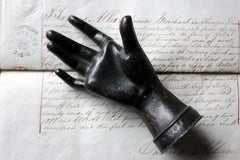 A Good Quality Victorian Dark Patinated Cast Iron Paperweight in the Form of a Ladies Hand c.1870-80