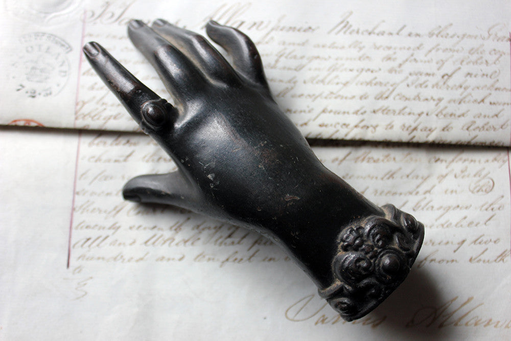 A Good Quality Victorian Dark Patinated Cast Iron Paperweight in the Form of a Ladies Hand c.1870-80