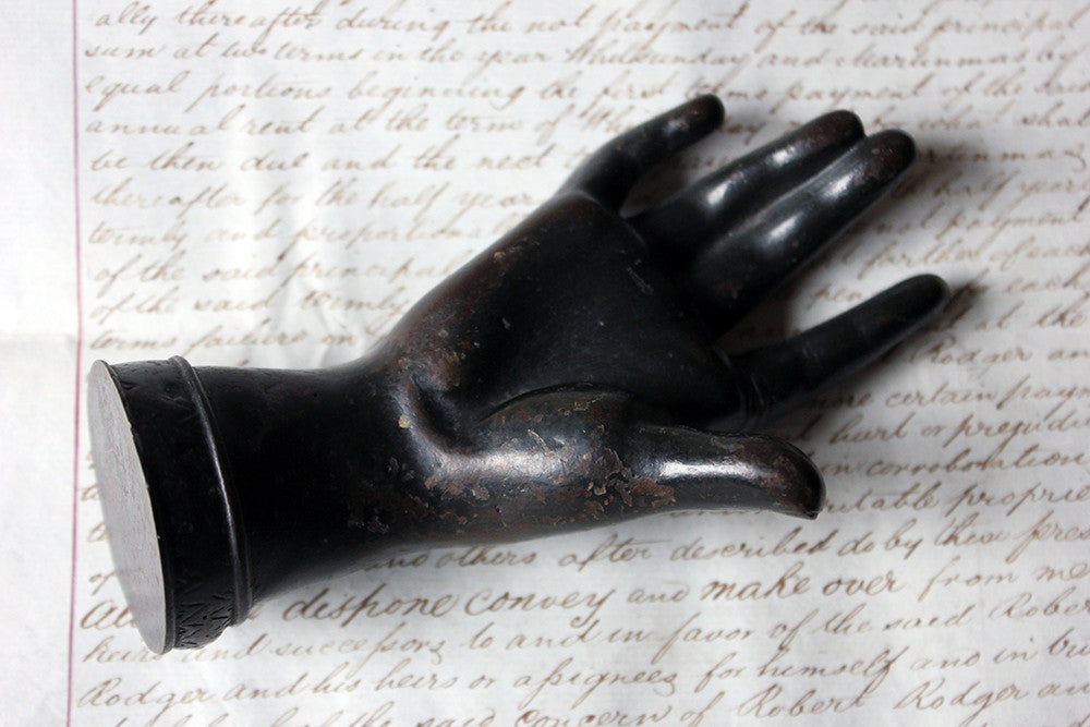 A Good Quality Victorian Dark Patinated Cast Iron Paperweight in the Form of a Ladies Hand c.1870-80