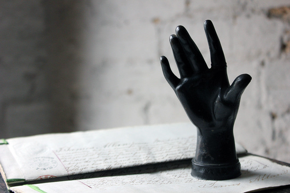 A Good Quality Victorian Dark Patinated Cast Iron Paperweight in the Form of a Ladies Hand c.1870-80