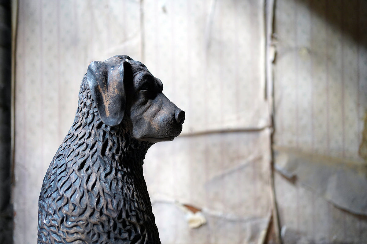 A French Animalier Bronzed Terracotta Sculpture of a Dog c.1900