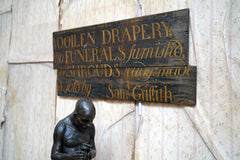 A Fragmentary Early-Victorian Painted Pine Drapers & Undertakers Sign c.1850-60