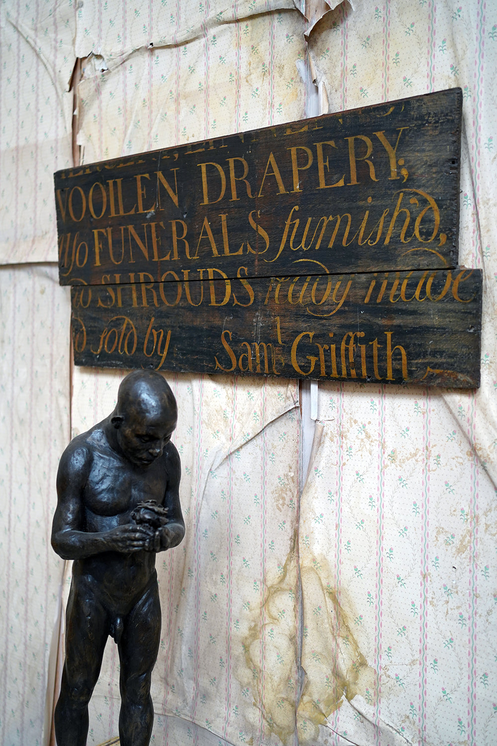 A Fragmentary Early-Victorian Painted Pine Drapers & Undertakers Sign c.1850-60