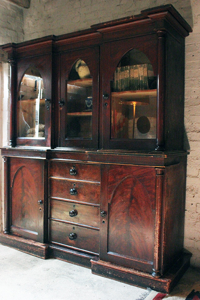 A Decorative c.1840 Gothic Revival Stained Pine Breakfront Bookcase