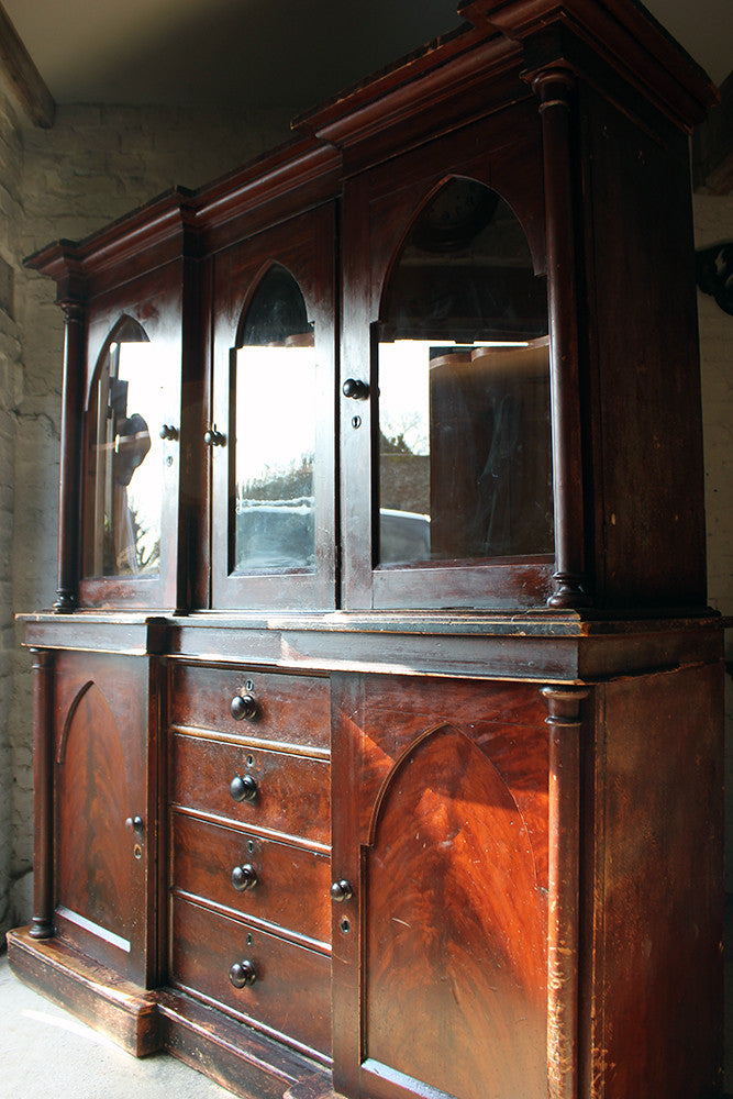 A Decorative c.1840 Gothic Revival Stained Pine Breakfront Bookcase