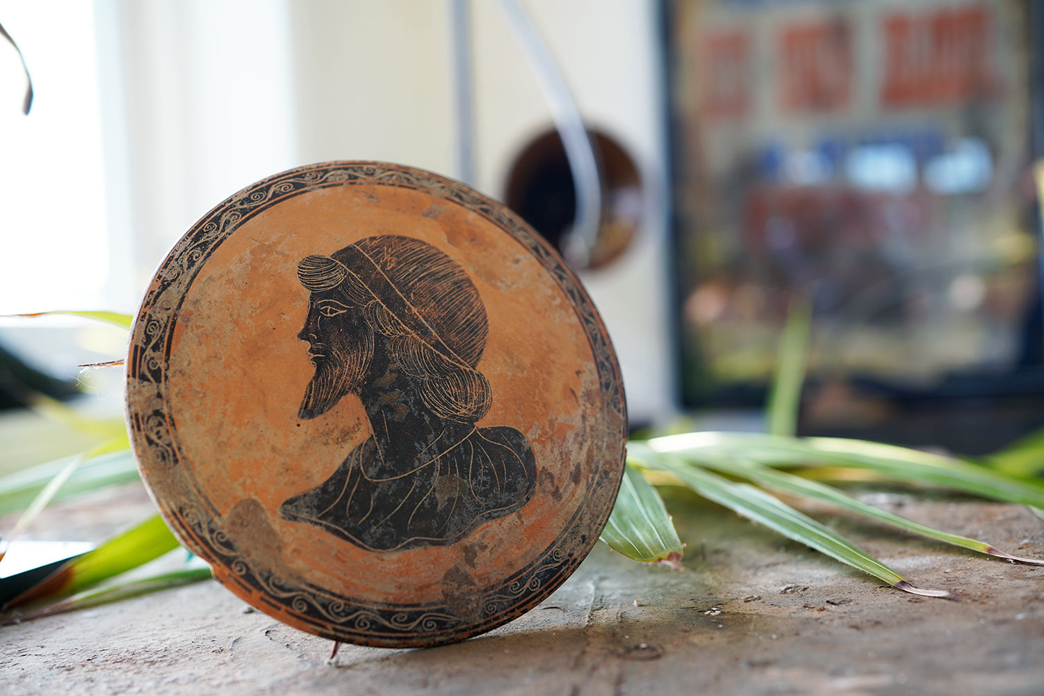 A Classical Greek Attic Pottery Portrait Roundel c.5-7thC B.C