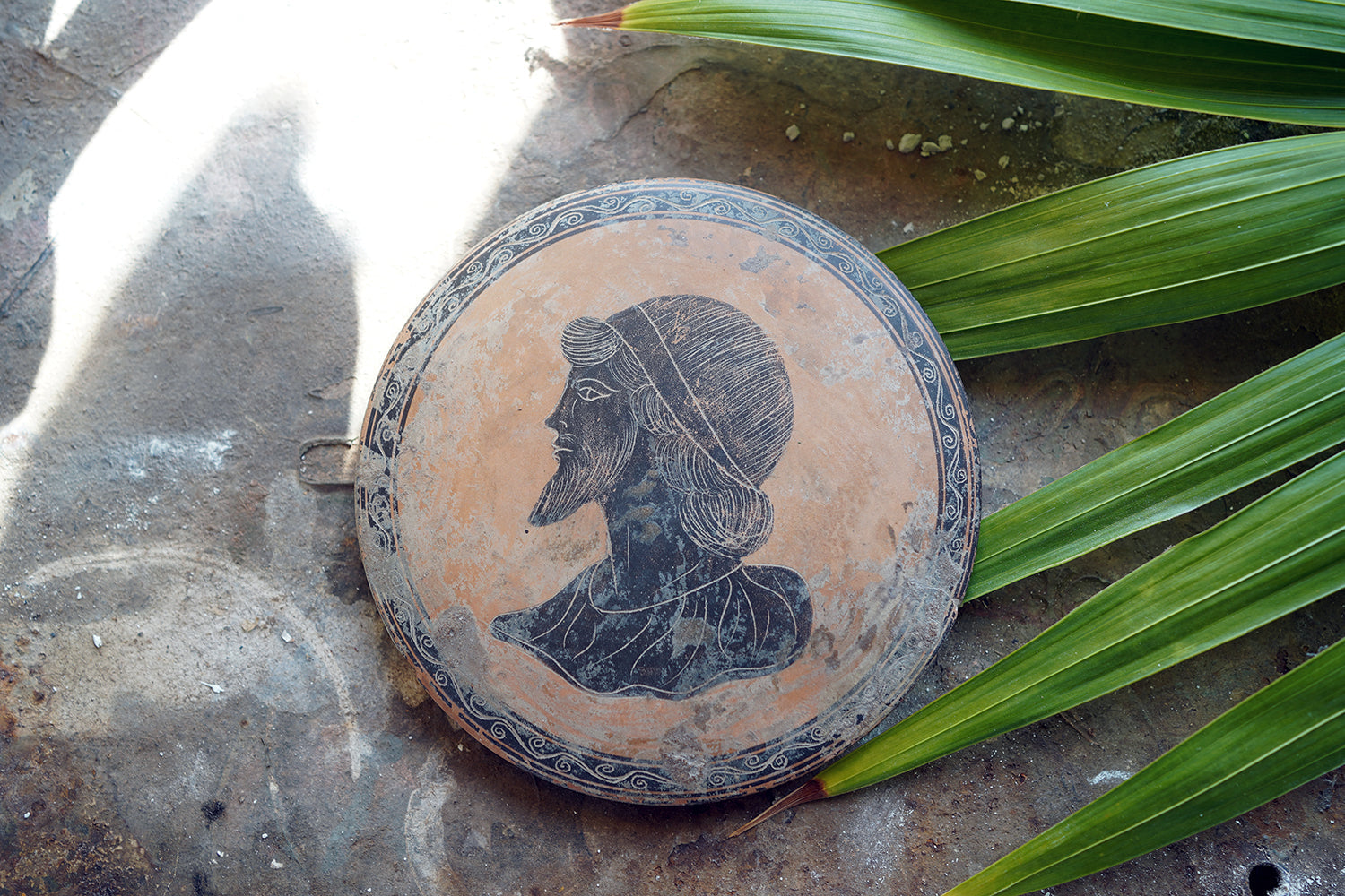 A Classical Greek Attic Pottery Portrait Roundel c.5-7thC B.C