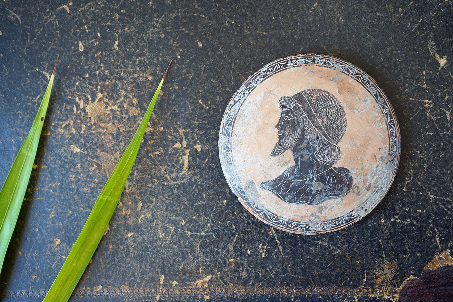 A Classical Greek Attic Pottery Portrait Roundel c.5-7thC B.C