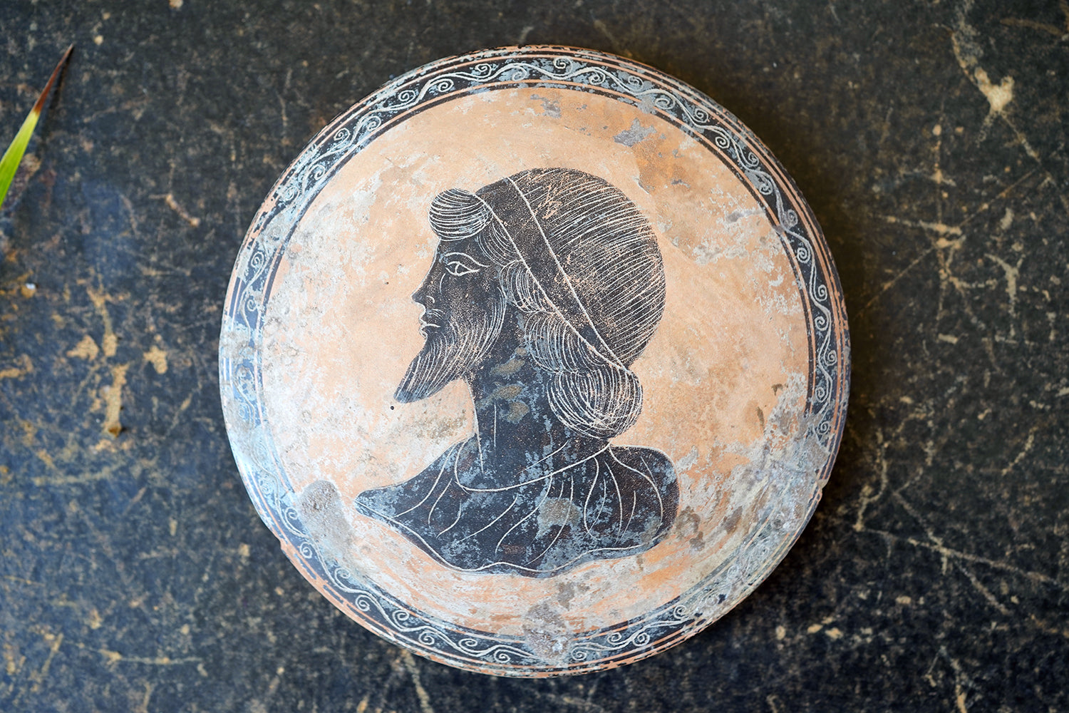 A Classical Greek Attic Pottery Portrait Roundel c.5-7thC B.C