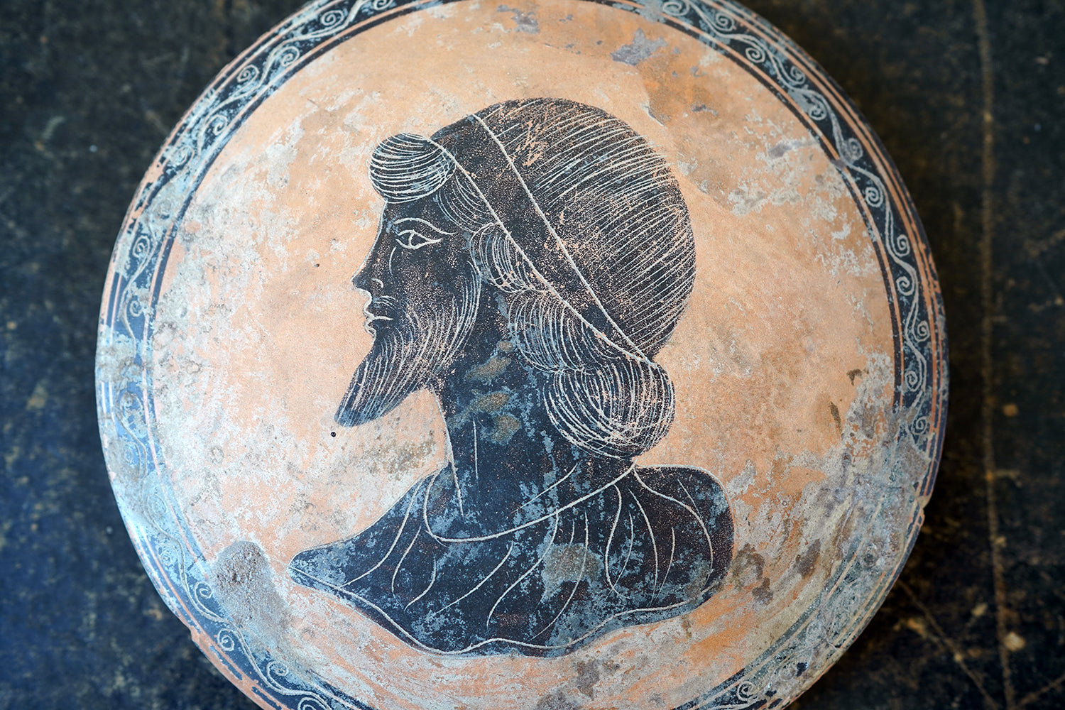 A Classical Greek Attic Pottery Portrait Roundel c.5-7thC B.C