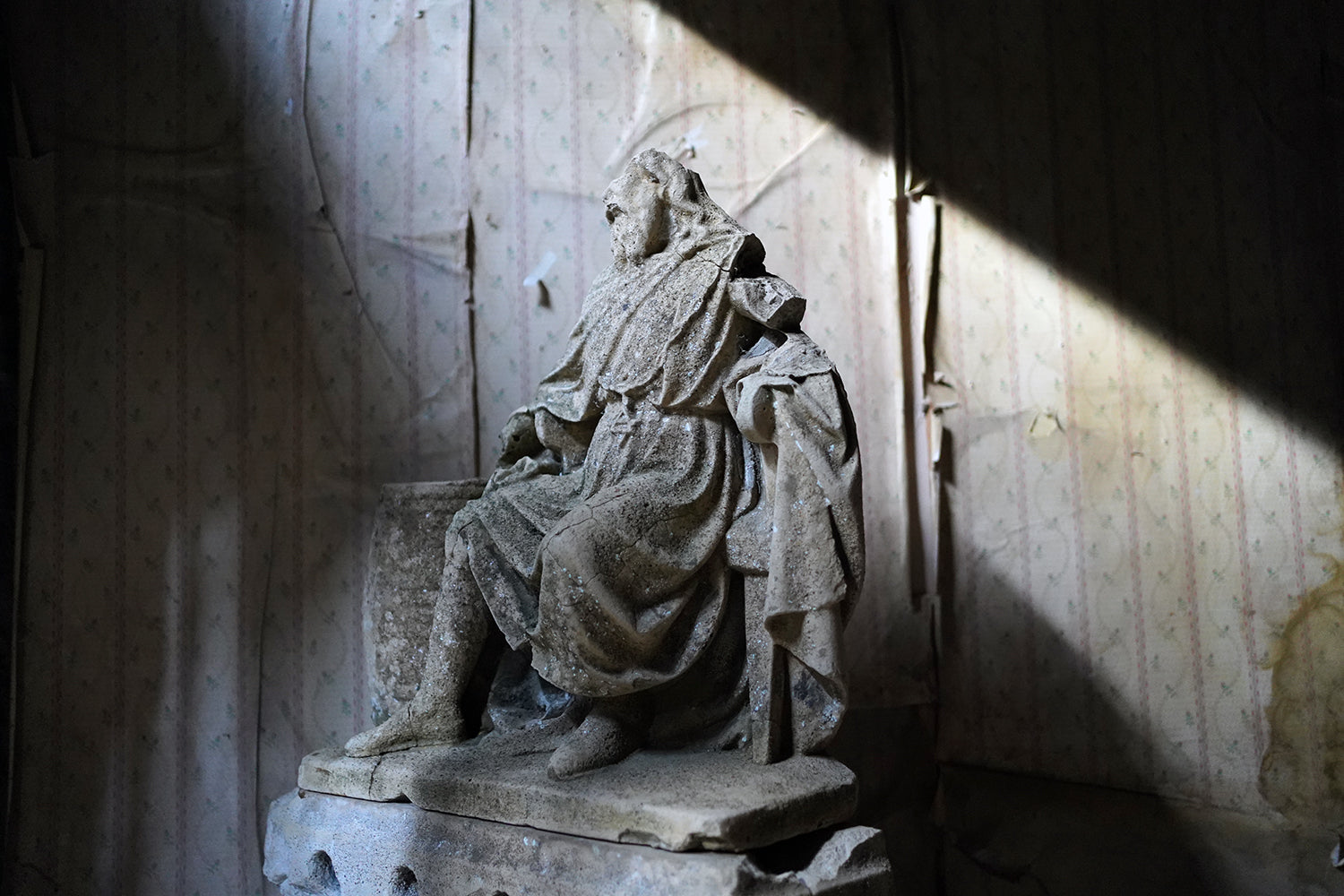 A Fragmentary Sandstone Sculpture of a Bearded Headless Saint c.1870 & Later