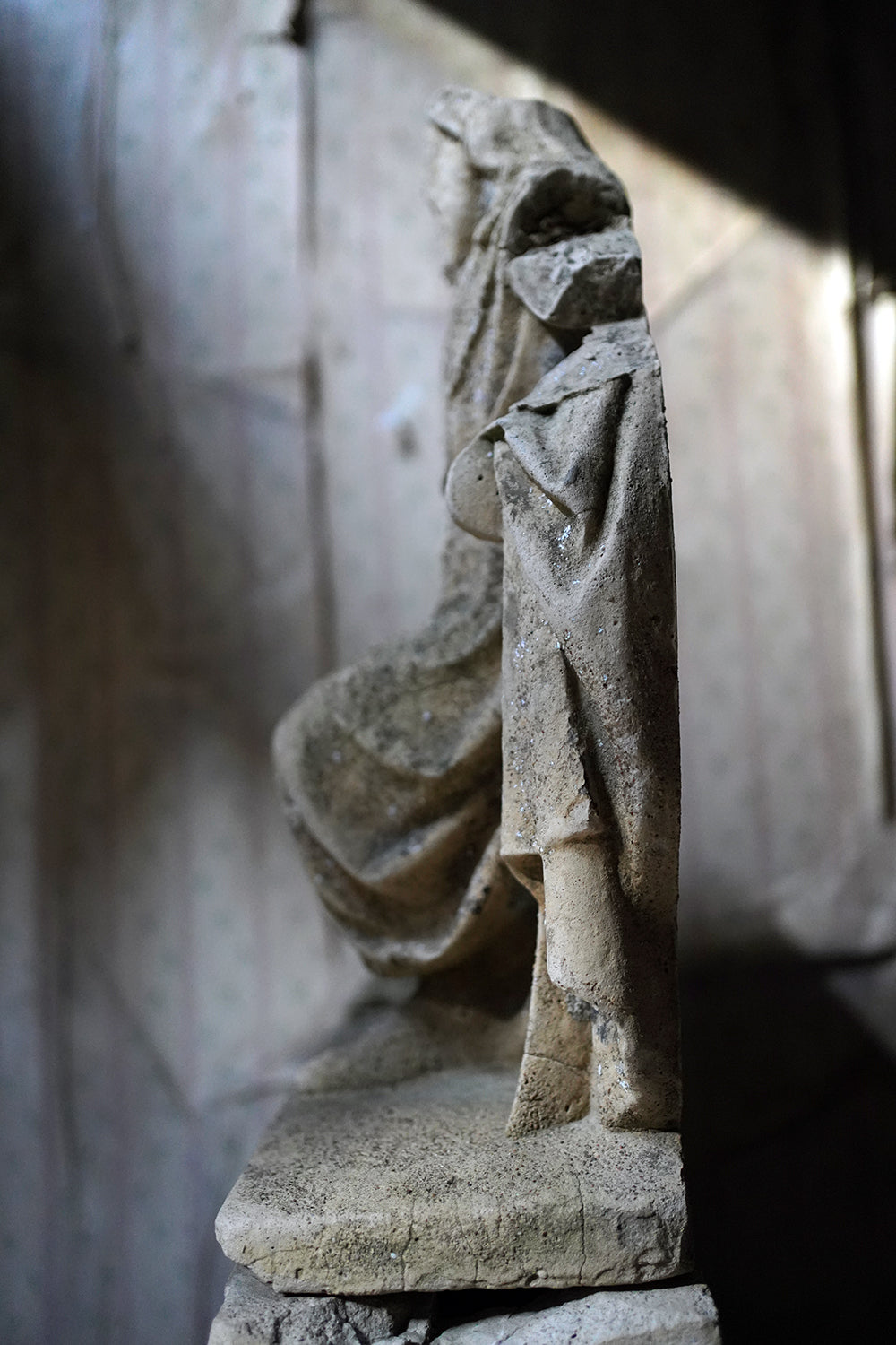 A Fragmentary Sandstone Sculpture of a Bearded Headless Saint c.1870 & Later