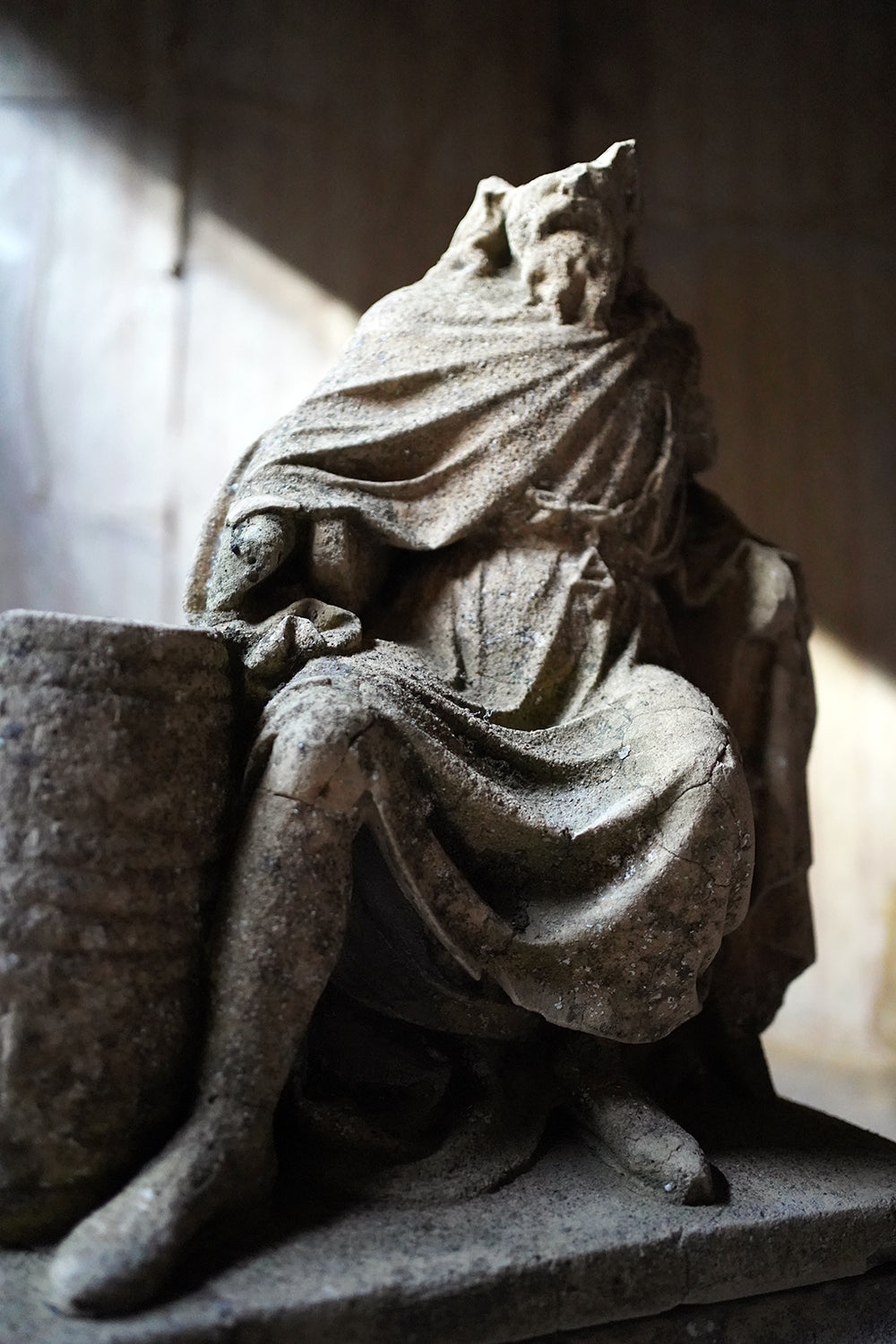 A Fragmentary Sandstone Sculpture of a Bearded Headless Saint c.1870 & Later