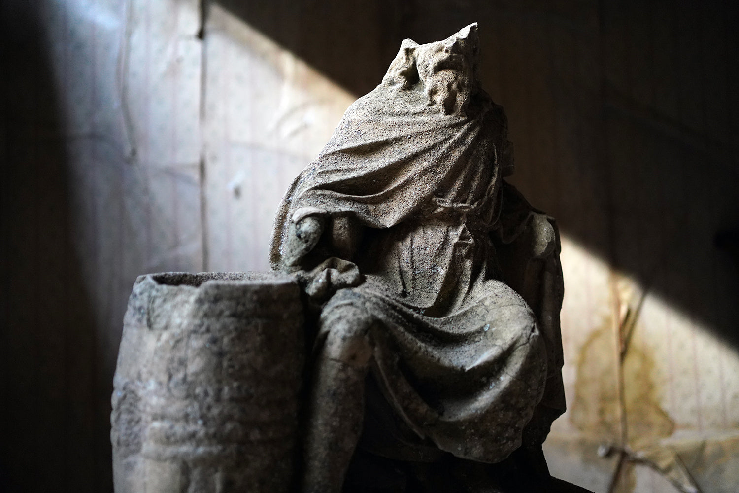 A Fragmentary Sandstone Sculpture of a Bearded Headless Saint c.1870 & Later