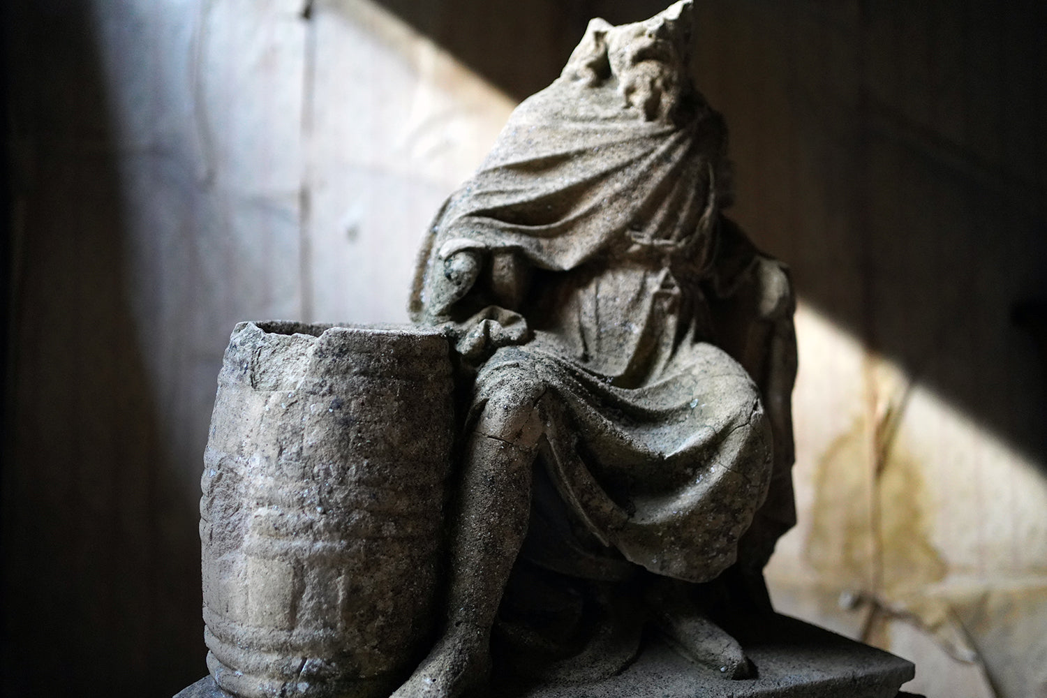 A Fragmentary Sandstone Sculpture of a Bearded Headless Saint c.1870 & Later