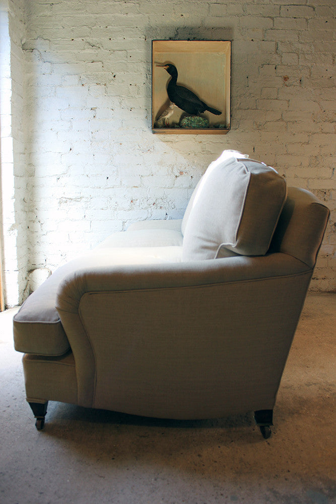 A Good Quality Upholstered Victorian Three-Seater Sofa in the Manner of Howard & Sons c.1890-1900