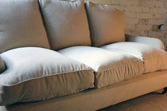 A Good Quality Upholstered Victorian Three-Seater Sofa in the Manner of Howard & Sons c.1890-1900