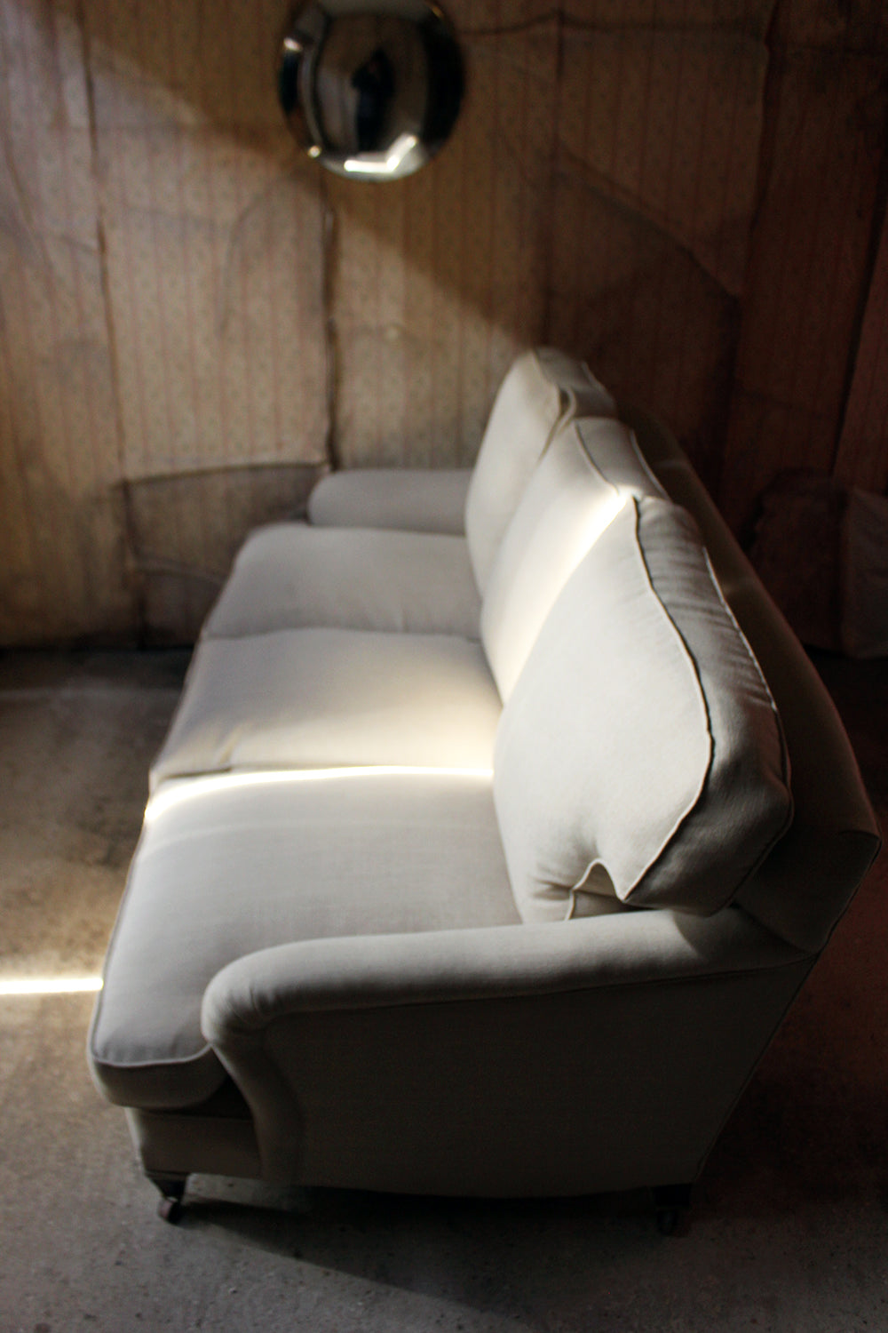 A Fine Quality Upholstered Victorian Three-Seater Sofa in the Manner of Howard & Sons c.1890-1900