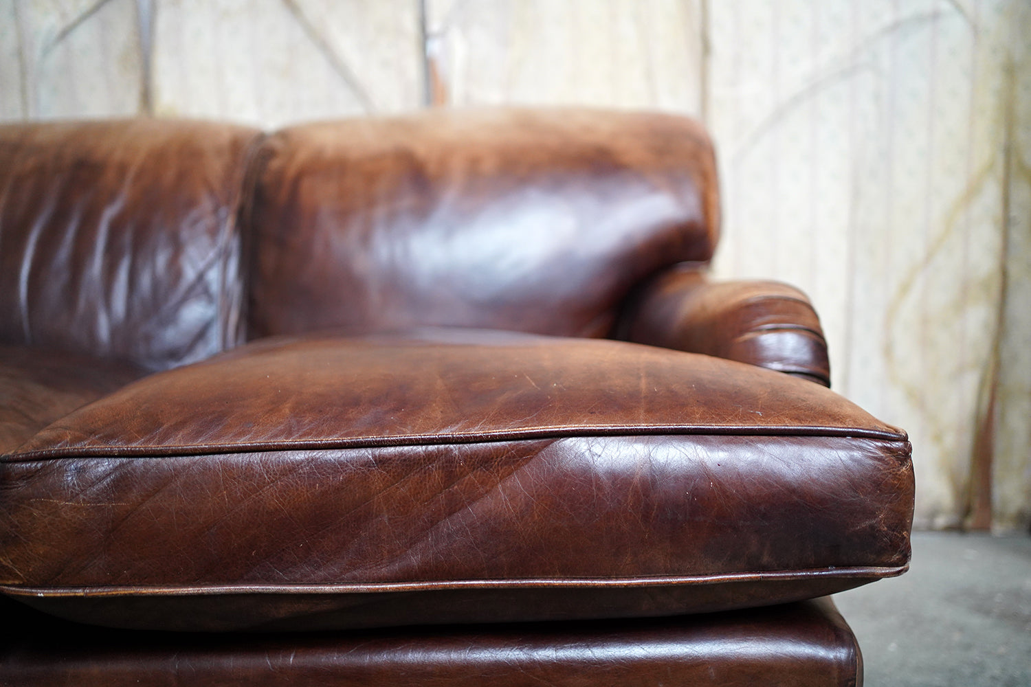 A Good Late 20thC Tan Leather Upholstered Sofa in the Manner of Howard & Sons