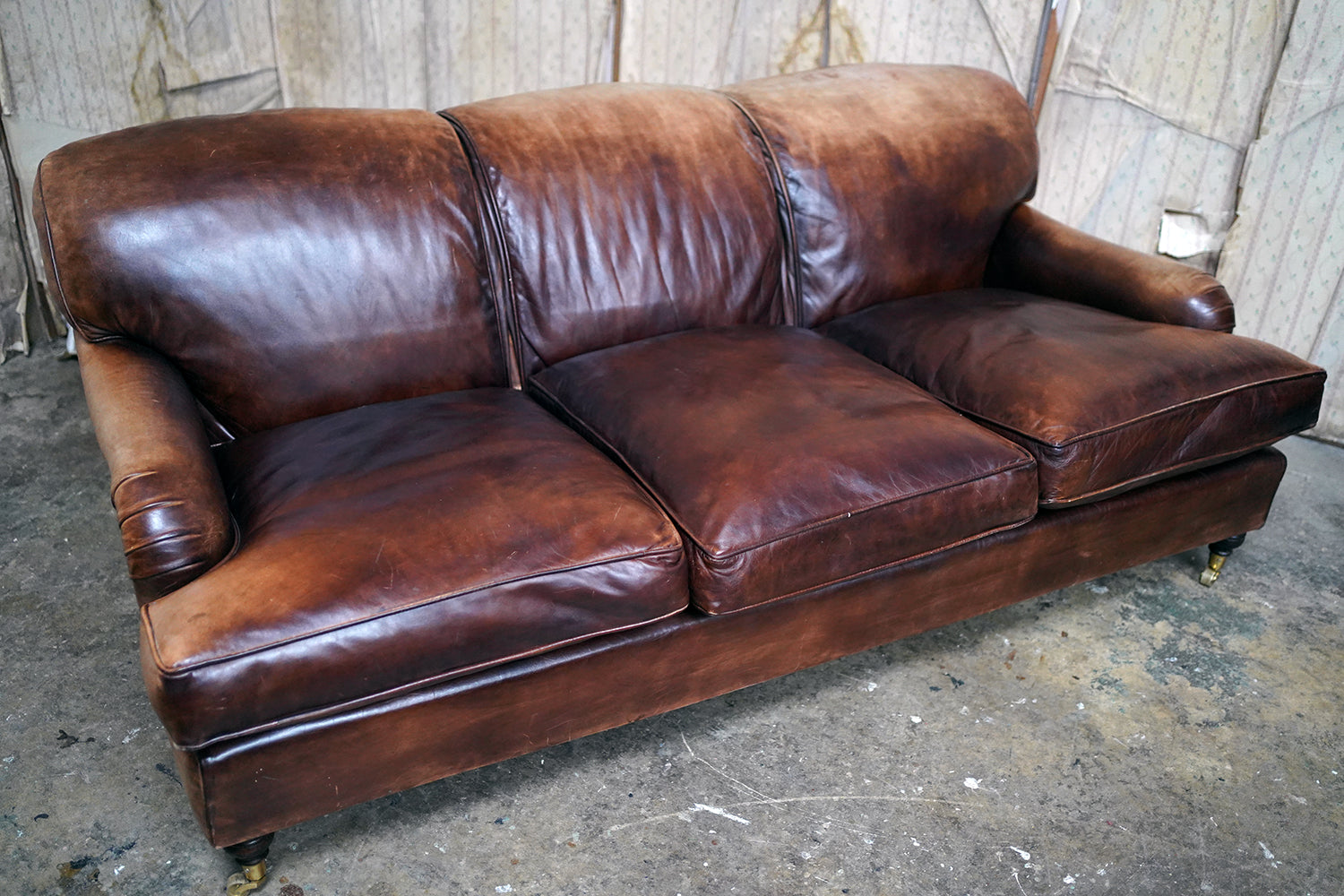 A Good Late 20thC Tan Leather Upholstered Sofa in the Manner of Howard & Sons