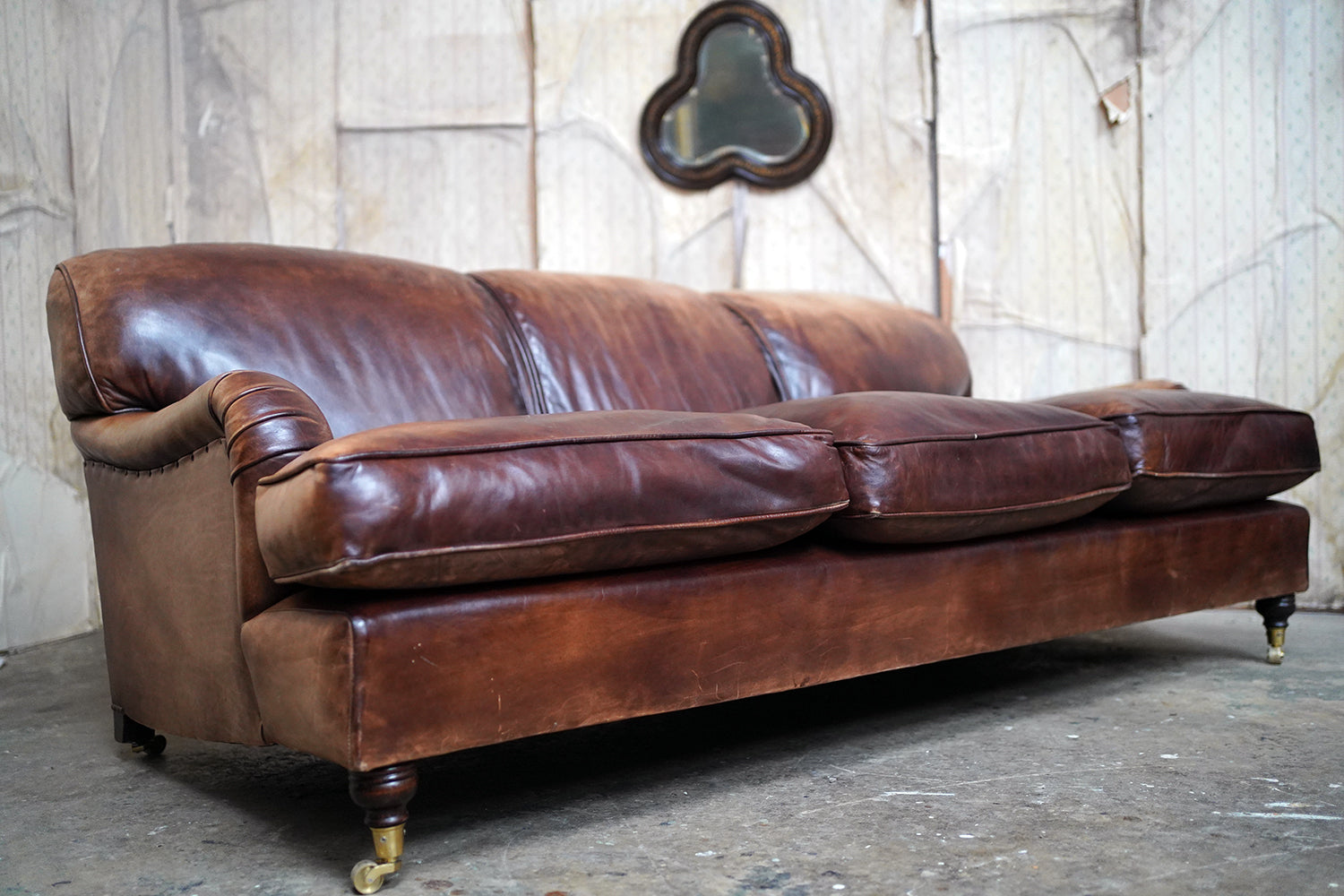 A Good Late 20thC Tan Leather Upholstered Sofa in the Manner of Howard & Sons