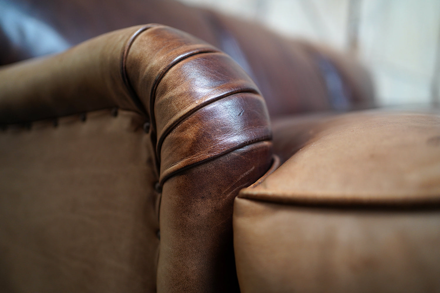 A Good Late 20thC Tan Leather Upholstered Sofa in the Manner of Howard & Sons