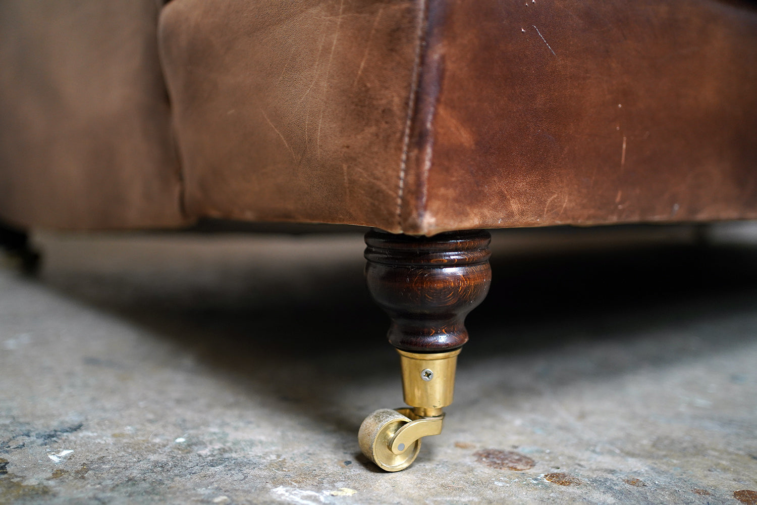 A Good Late 20thC Tan Leather Upholstered Sofa in the Manner of Howard & Sons