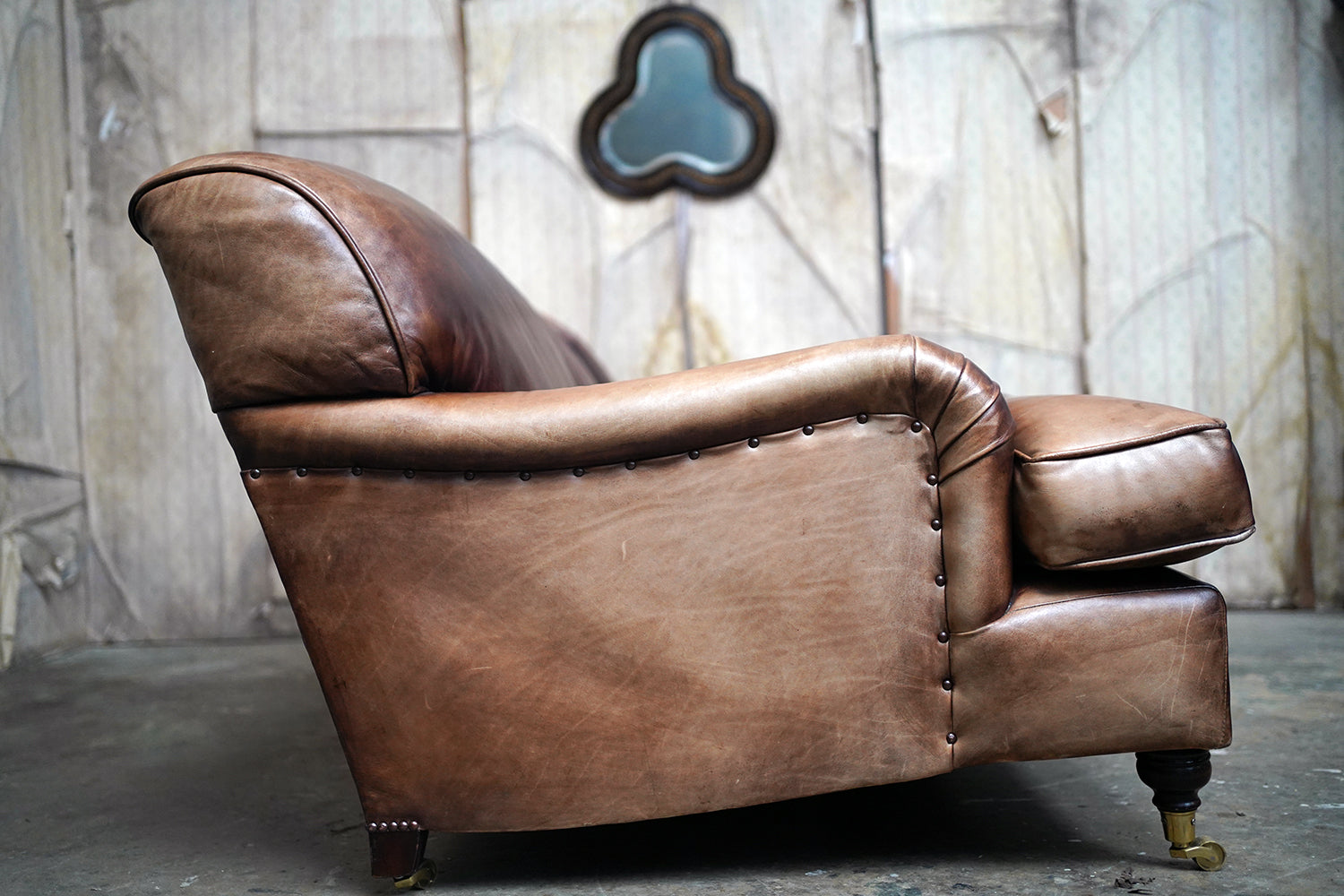 A Good Late 20thC Tan Leather Upholstered Sofa in the Manner of Howard & Sons