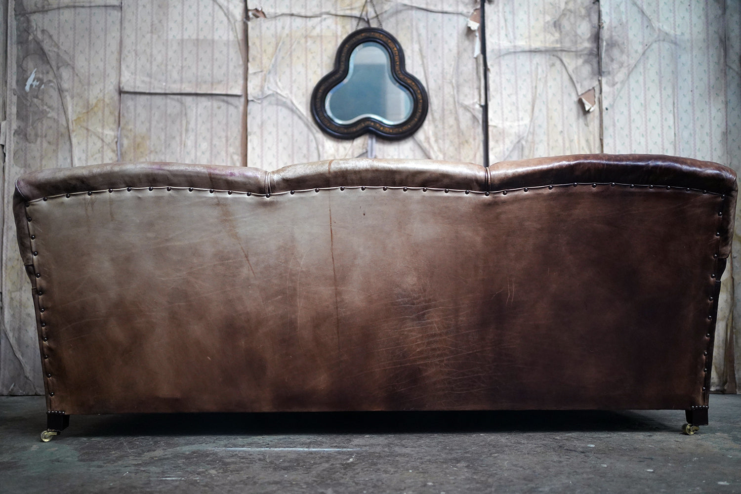 A Good Late 20thC Tan Leather Upholstered Sofa in the Manner of Howard & Sons