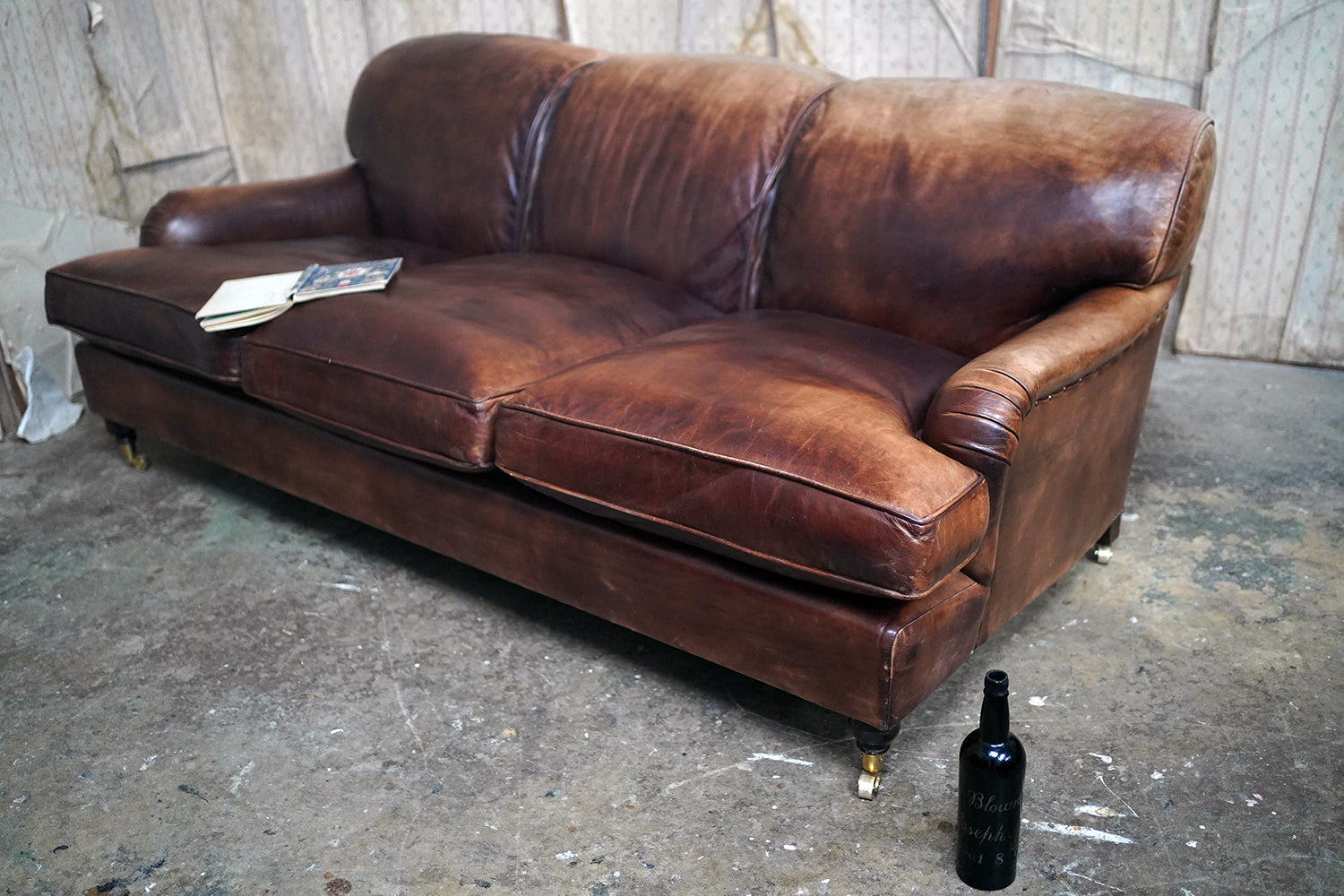 A Good Late 20thC Tan Leather Upholstered Sofa in the Manner of Howard & Sons