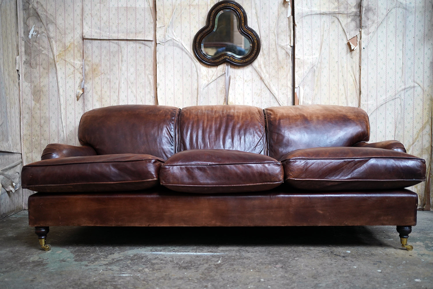 A Good Late 20thC Tan Leather Upholstered Sofa in the Manner of Howard & Sons