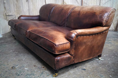 A Good Late 20thC Tan Leather Upholstered Sofa in the Manner of Howard & Sons