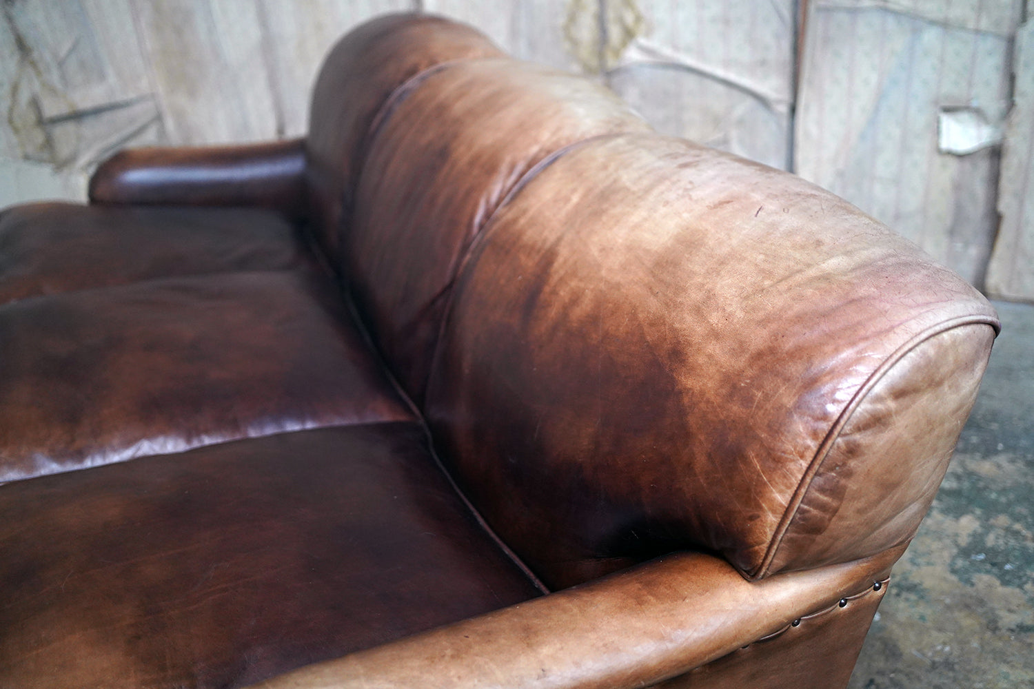 A Good Late 20thC Tan Leather Upholstered Sofa in the Manner of Howard & Sons