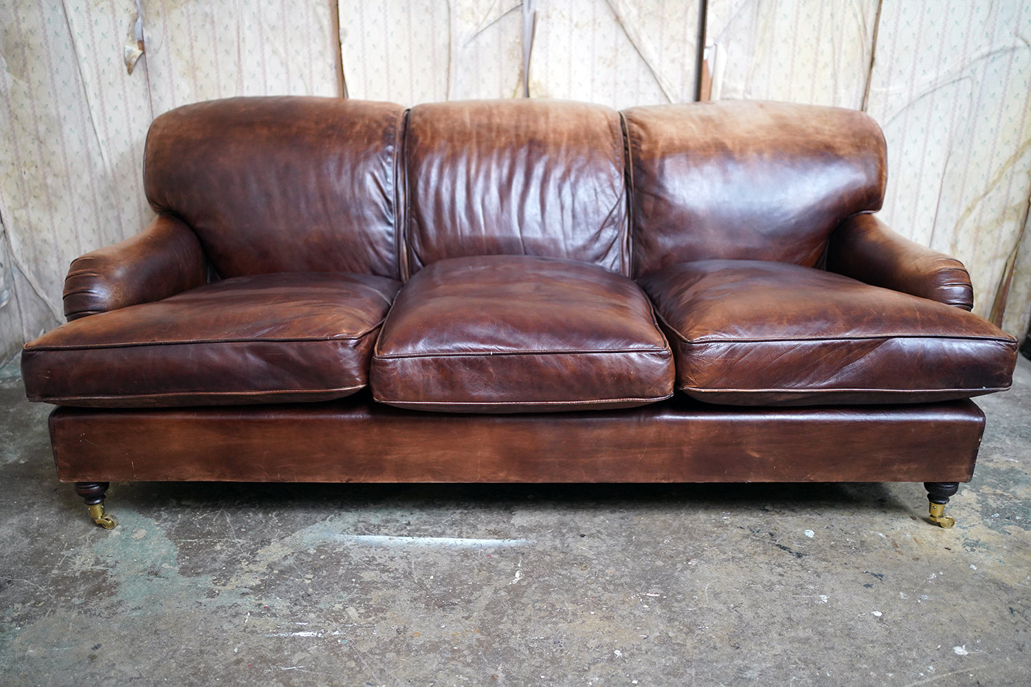 A Good Late 20thC Tan Leather Upholstered Sofa in the Manner of Howard & Sons