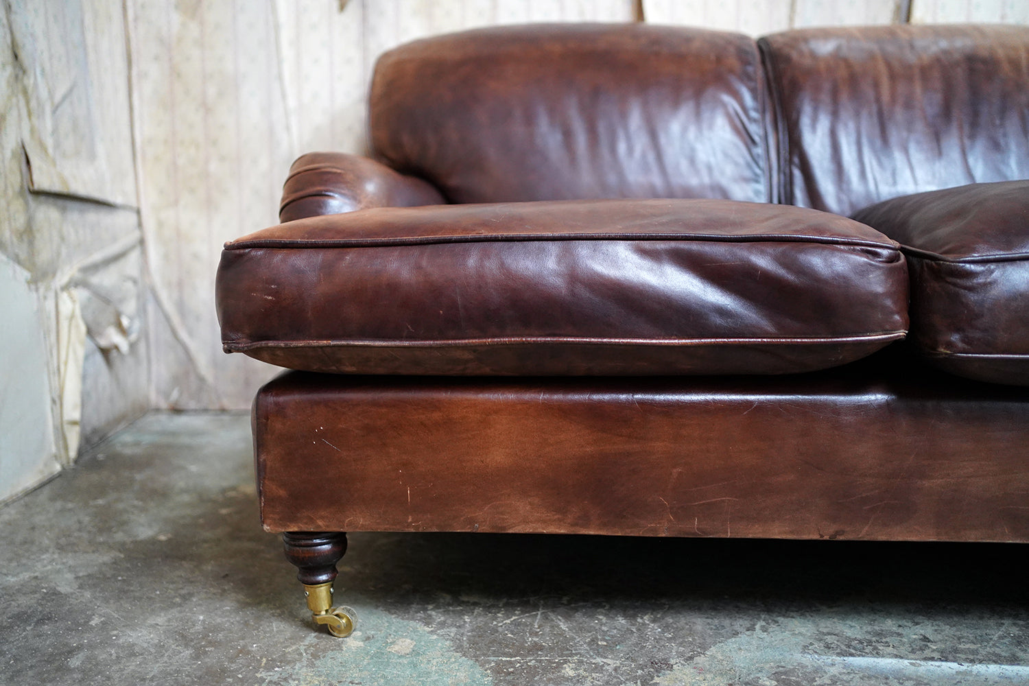 A Good Late 20thC Tan Leather Upholstered Sofa in the Manner of Howard & Sons