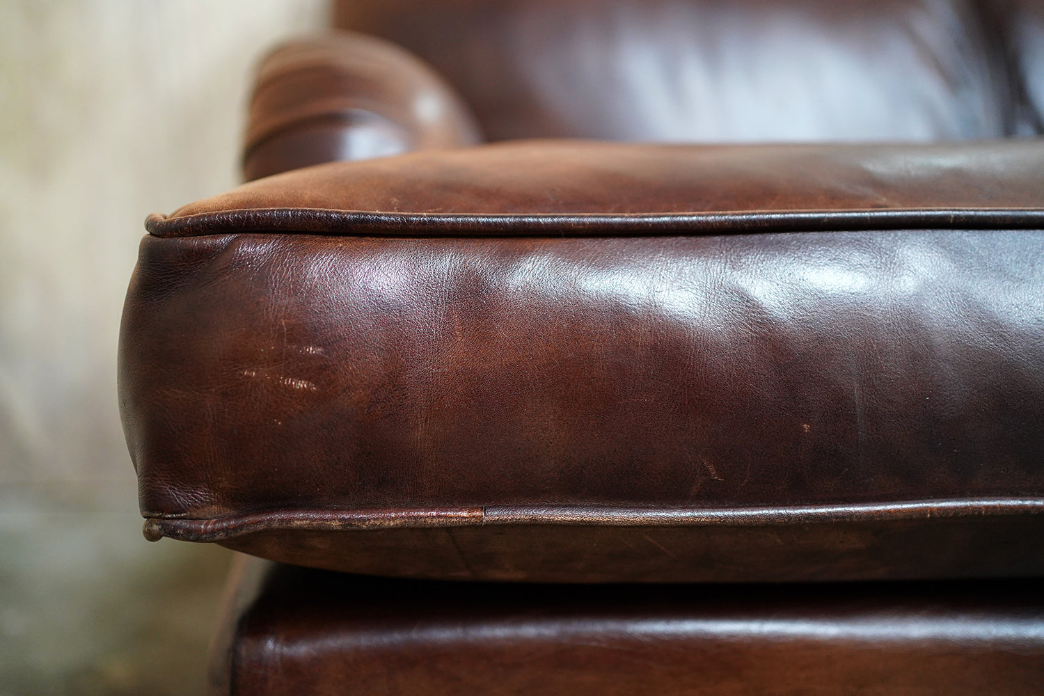 A Good Late 20thC Tan Leather Upholstered Sofa in the Manner of Howard & Sons