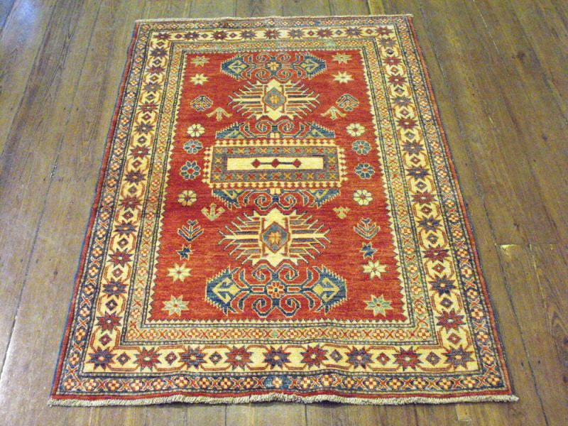 A Good Quality Supreme Afghan Kazak Rug: 179cm x 125cm