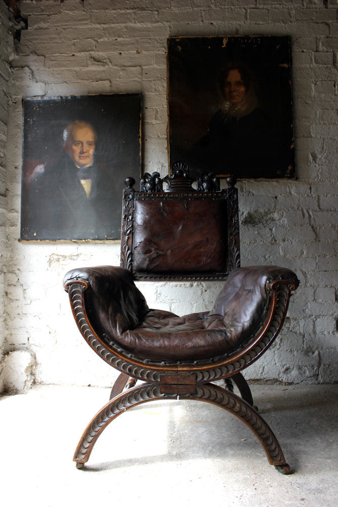 A Good 19thC Carved Oak & Leather Upholstered Savonarola Armchair