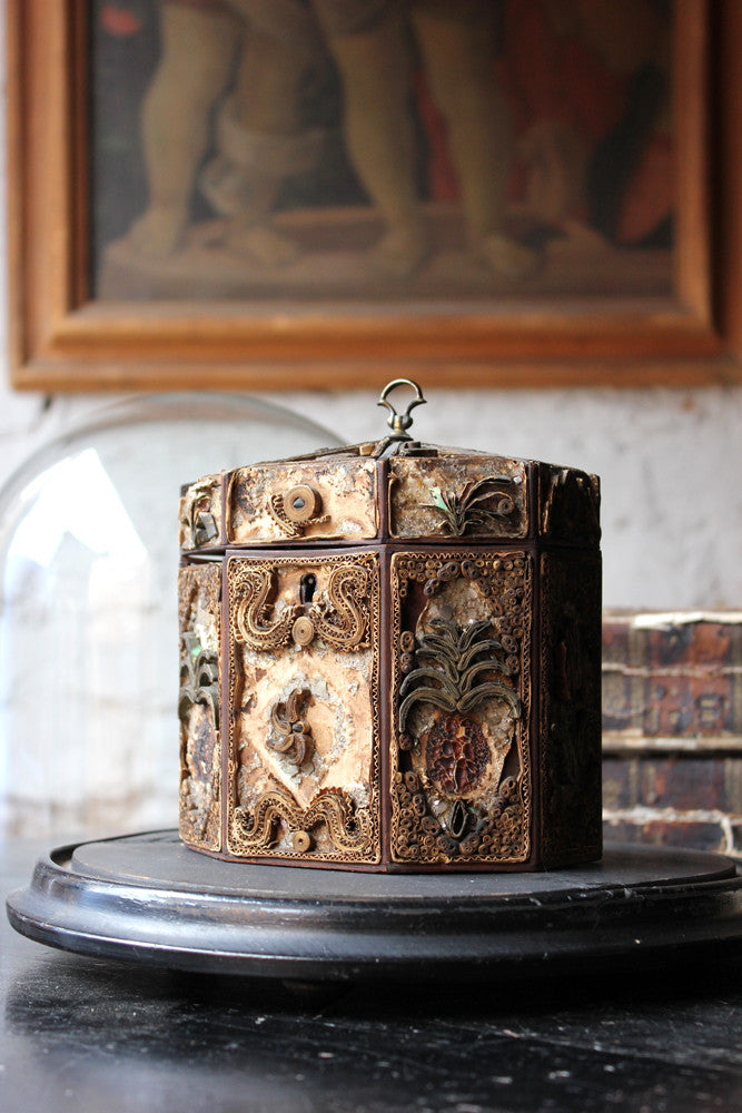 A Distressed George III Rolled Paper Filigree Octagonal Tea Caddy Under a 19thC Glass Dome