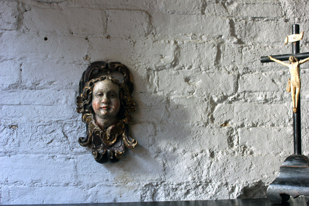 A Fine Early 18thC Polychrome Painted Cherub Head Mask