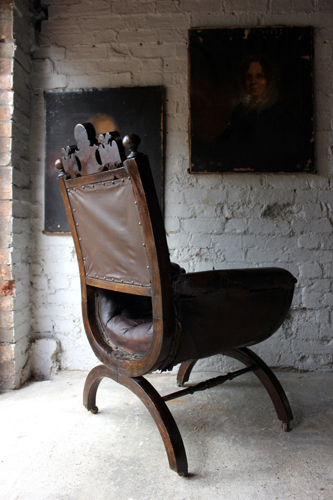 A Good 19thC Carved Oak & Leather Upholstered Savonarola Armchair